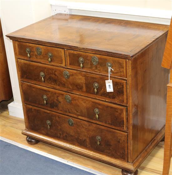 An 18th century walnut chest of three long and two short drawers W.87cm